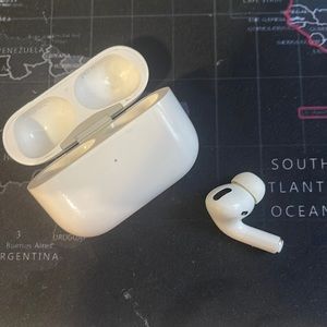 Left AirPod pro and case